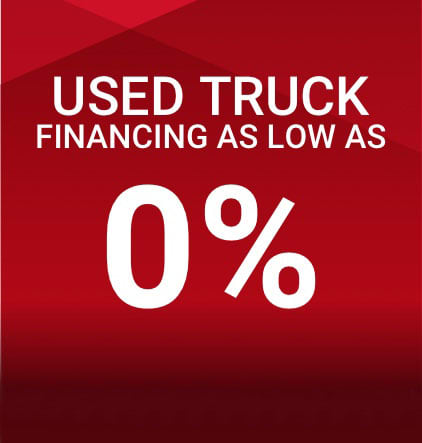 red backround image with used truck financing as low as 0 percent interest rate white text