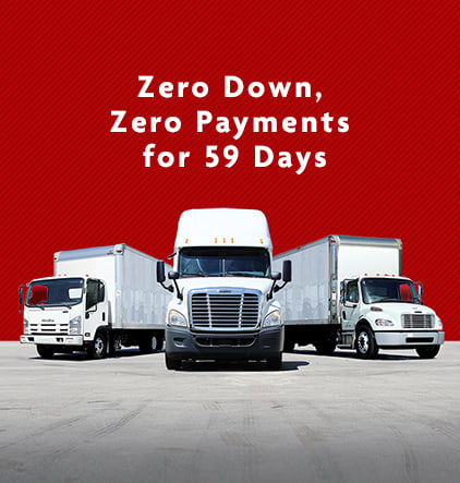 white commercial trucks lineup with zero down, zero payments for 59 days white text above