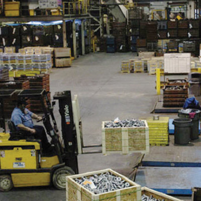 Warehouse worker on a forklift