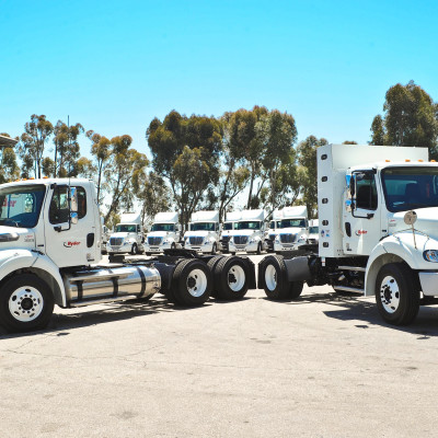 Many Semi Tractors parked