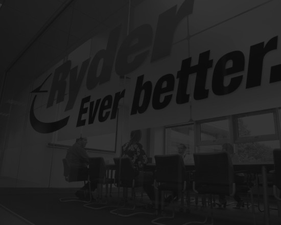 Ryder Birmingham office in use for meeting in black and white