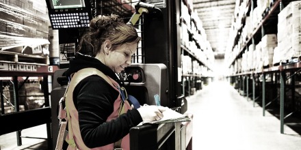 Warehouse worker with clipboard