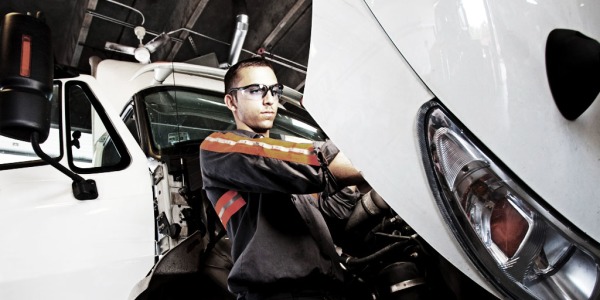 Truck Technician working on truck