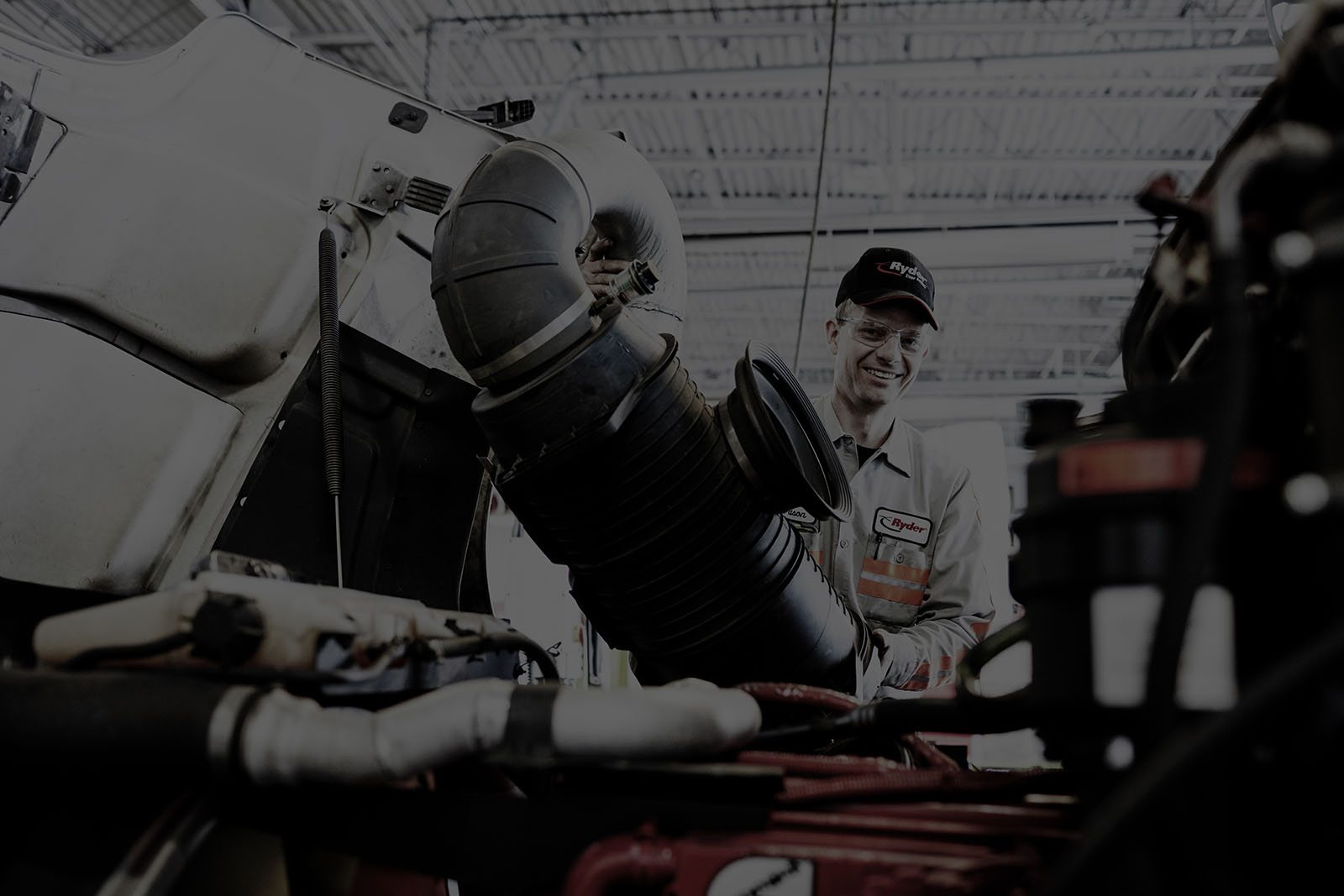 Mechanics working a truck