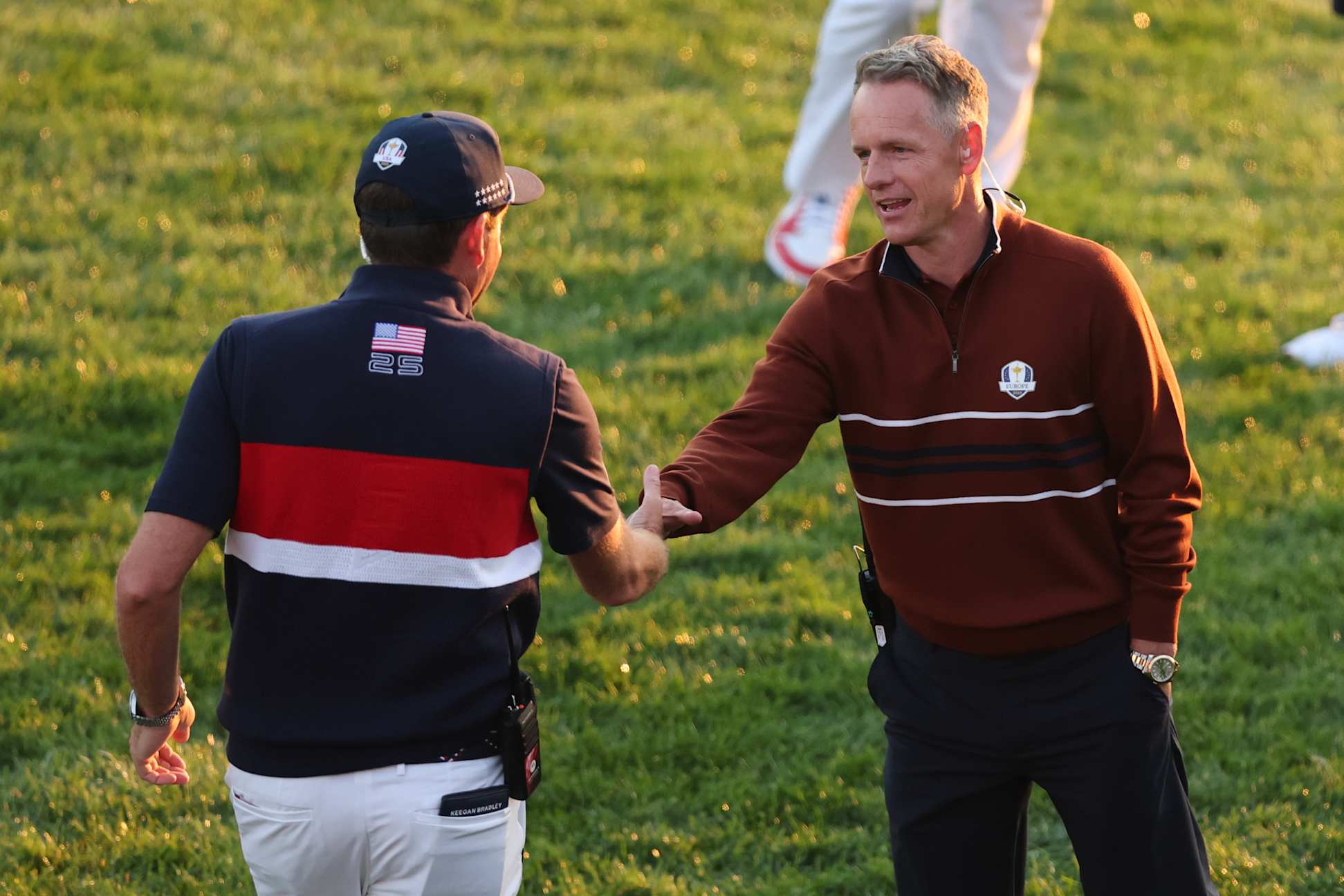 FARMINGDALE, NY - SEPTEMBER 27: Team Europe Captain Luke Donald shakes hands with Team United States Captain Keegan Bradley on the first tee box during the 2025 Ryder Cup at Bethpage State Park on Saturday, September 27, 2025 in Farmingdale, New York. (Photo by Michael Reaves/PGA of America)