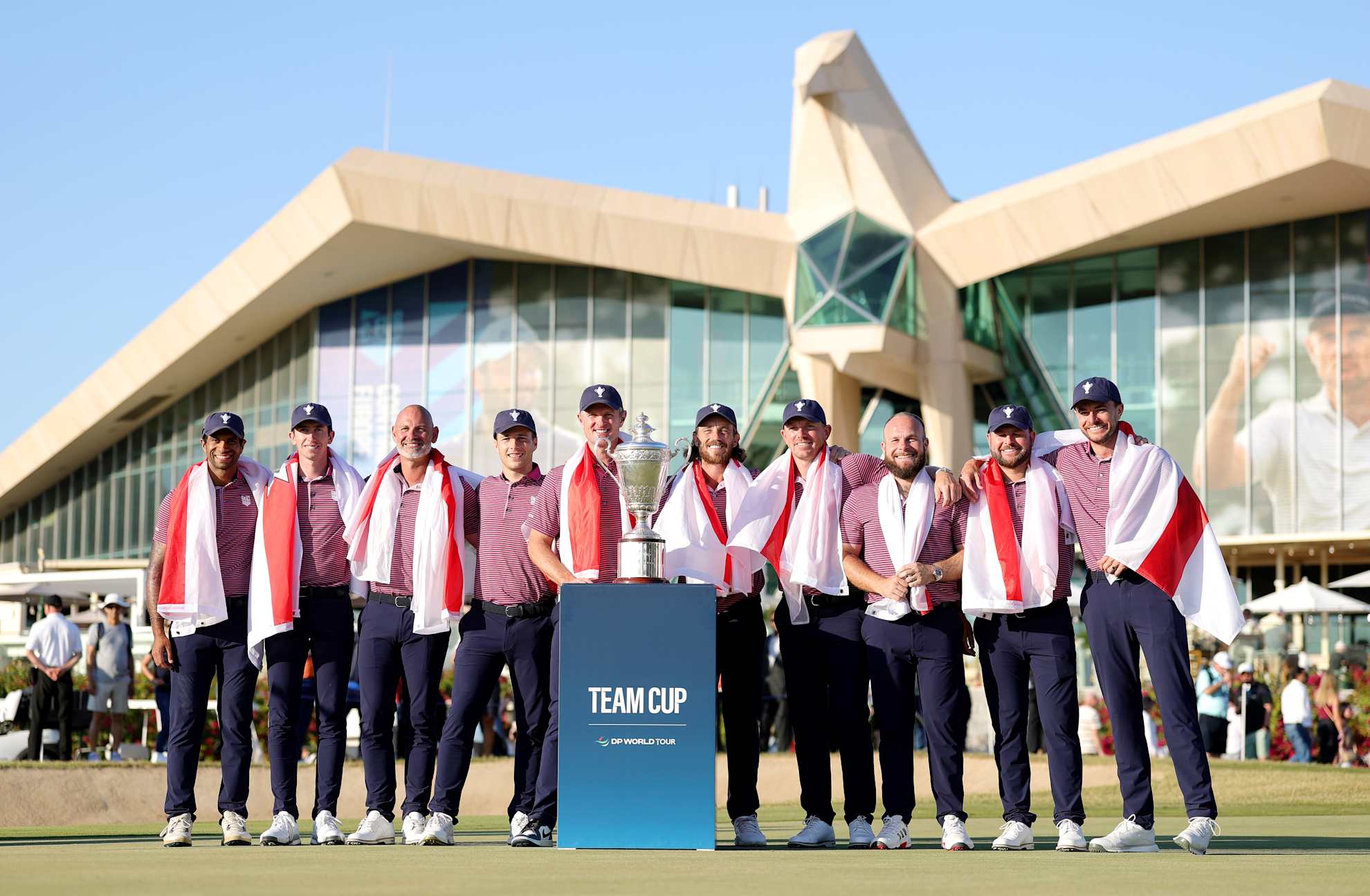 ABU DHABI, UNITED ARAB EMIRATES - JANUARY 12: (L-R) Aaron Rai, Tom McKibbin, Paul Waring, Matthew Jordan, Justin Rose, Tommy Fleetwood, Matt Wallace, Jordan Smith and Laurie Canter of Team Great Britain & Ireland celebrate victory during the Singles Matches on Day Three of the Team Cup at Abu Dhabi Golf Resort on January 12, 2025 in Abu Dhabi, United Arab Emirates. (Photo by Richard Heathcote/Getty Images)