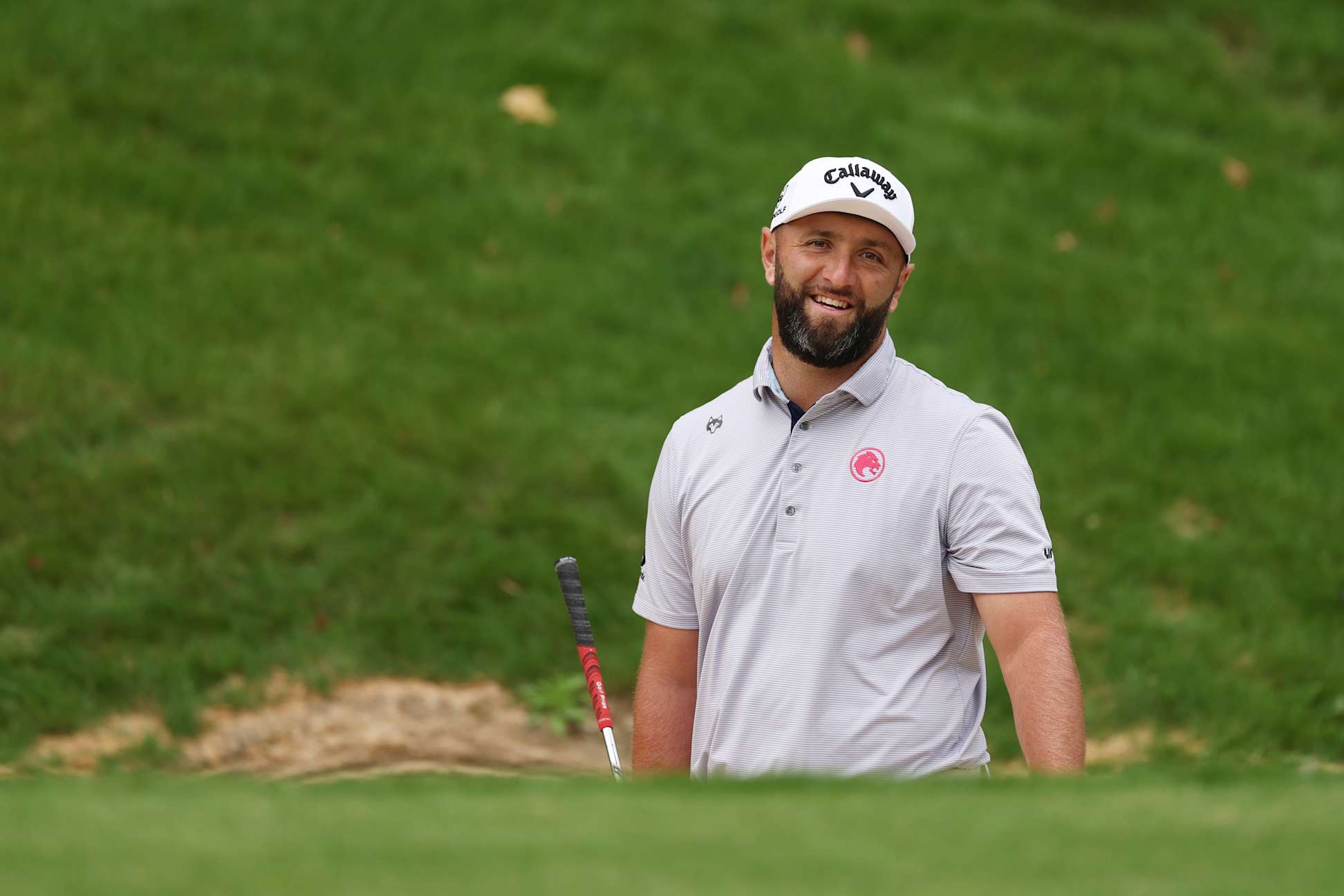 VIRGINIA WATER, ENGLAND - SEPTEMBER 15: Jon Rahm of Spain reacts to a shot during a practice round, prior to the BMW PGA Championship at Wentworth Golf Club on September 15, 2026 in Virginia Water, England. (Photo by Andrew Redington/Getty Images)