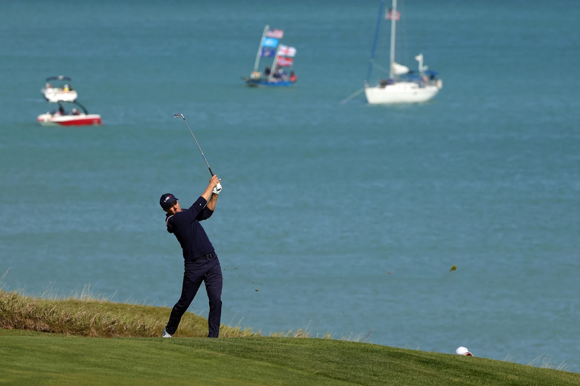 KOHLER, WISCONSIN - SEPTEMBER 25: Jordan Spieth of team United States plays his shot on the fourth hole during Saturday Morning Foursome Matches of the 43rd Ryder Cup at Whistling Straits on September 25, 2021 in Kohler, Wisconsin. (Photo by Stacy Revere/Getty Images)