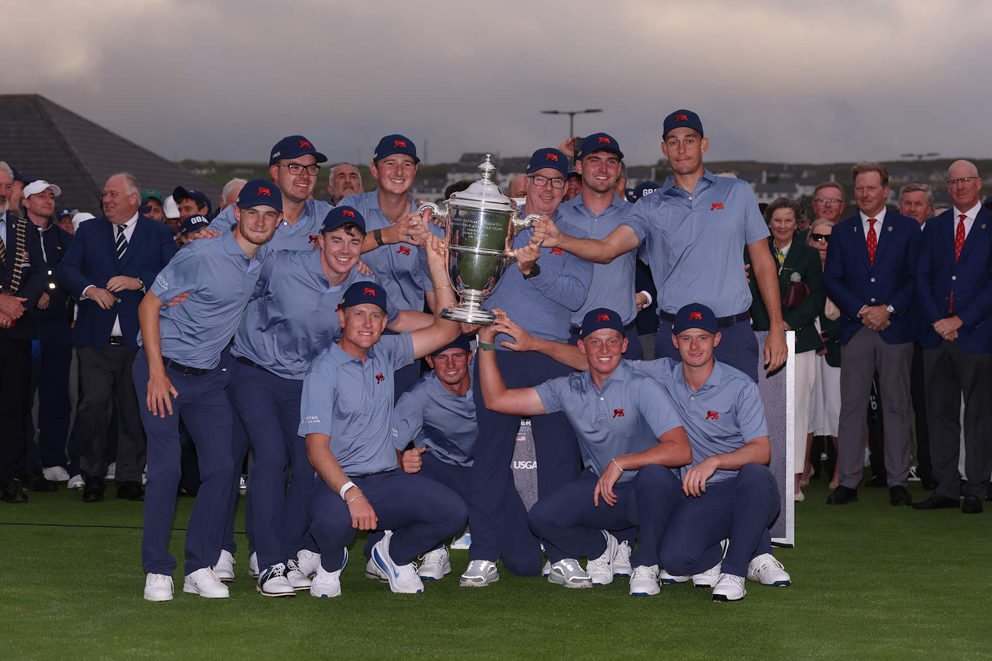 LAHINCH, IRELAND - SEPTEMBER 06: Players and captain of Team GB&I pose with the Walker Cup following their victory on day two of the Walker Cup at Lahinch Golf Club on September 06, 2026 in Lahinch, County Clare. (Photo by Warren Little/Getty Images)