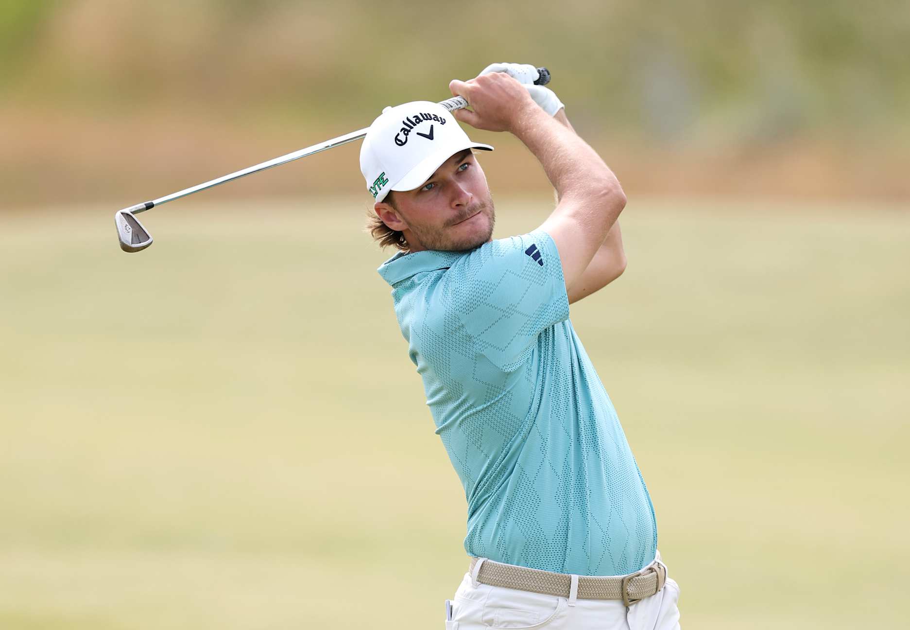 NORTH BERWICK, SCOTLAND - JULY 10: Rasmus Hojgaard of Denmark plays his second shot on the 10th hole on day one of the Genesis Scottish Open 2025 at The Renaissance Club on July 10, 2025 in North Berwick, Scotland. (Photo by Warren Little/Getty Images)