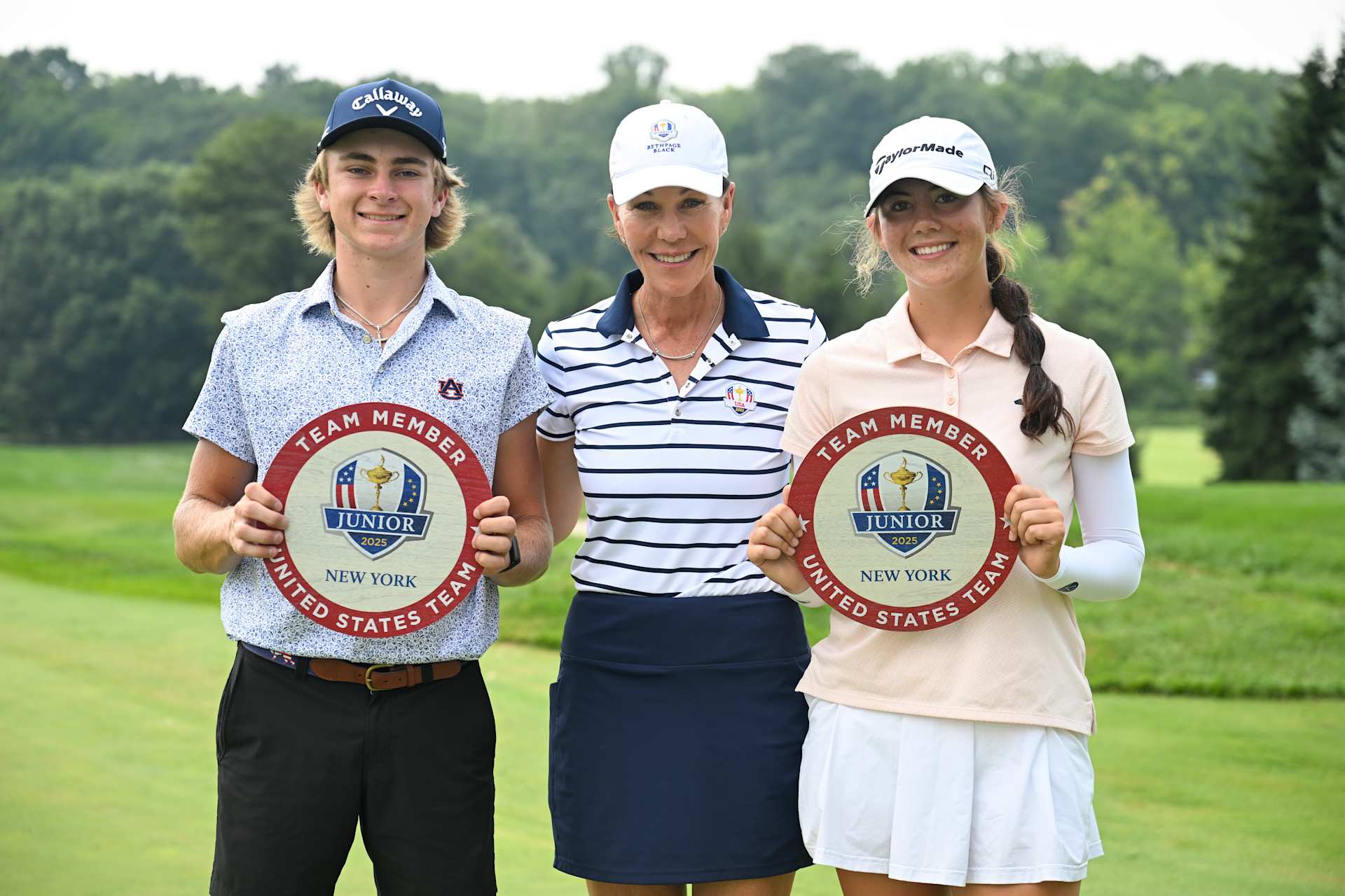WEST LAFAYETTE, IN - AUGUST 01: Boys Division 2025 Junior PGA Champion Lunden Esterline, PGA of America Honorary President and Golf Commentator Suzy Whaley, and Girls Division 2025 Junior PGA Champion Asterisk Talley pose with their Junior Ryder Cup team member qualifying awards together after the 2025 Junior PGA Championship at Birck Boilermaker Golf Complex on Friday, August 1, 2025 in West Lafayette, Indiana. (Photo by Ryan Lochhead/PGA of America)