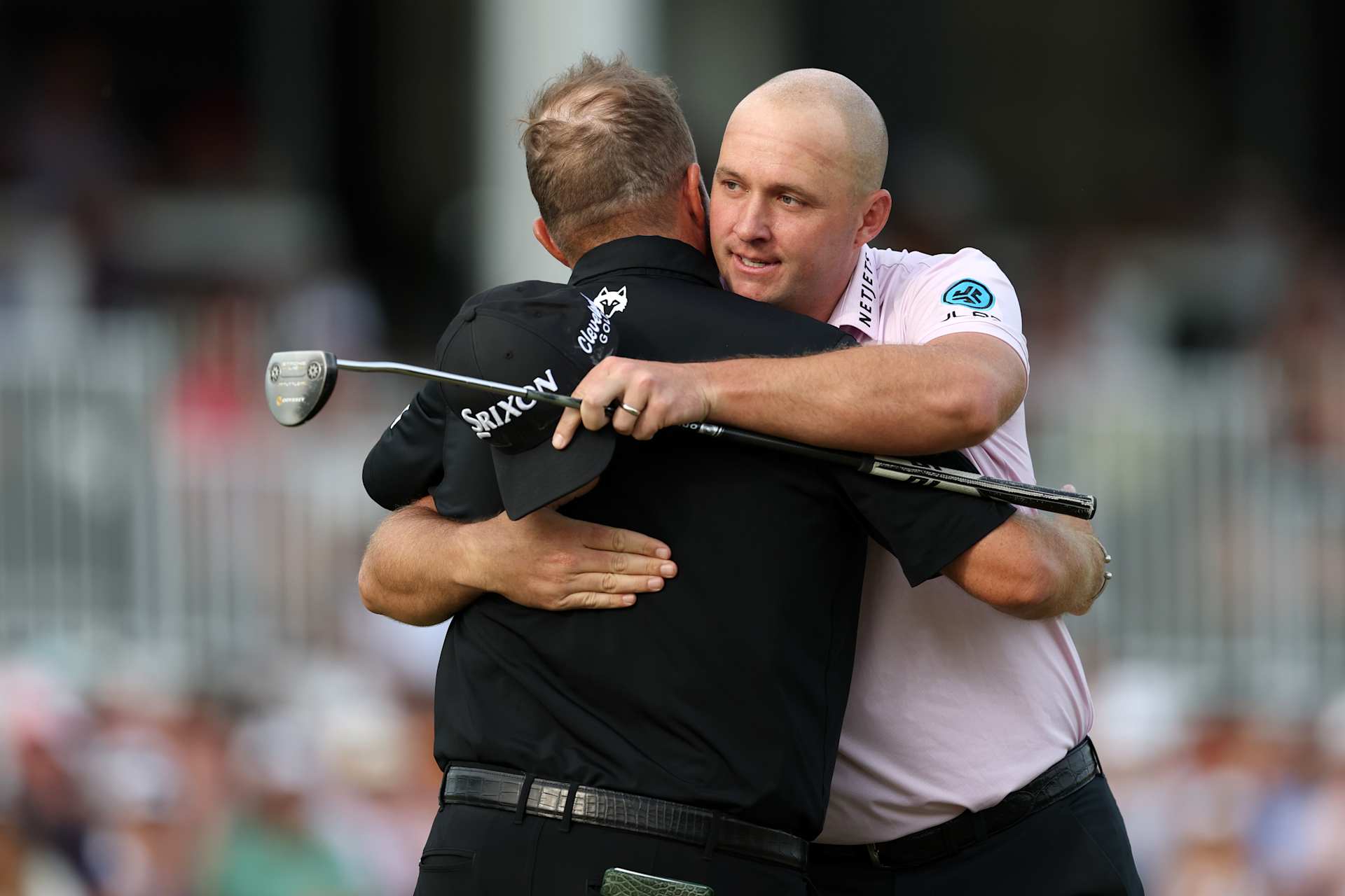 FLOURTOWN, PENNSYLVANIA - MAY 11: Sepp Straka of Austria reacts with Shane Lowry of Ireland after putting in to win on the 18th green during the final round of the Truist Championship 2025 at The Wissahickon at Philadelphia Cricket Club on May 11, 2025 in Flourtown, Pennsylvania. (Photo by Emilee Chinn/Getty Images)