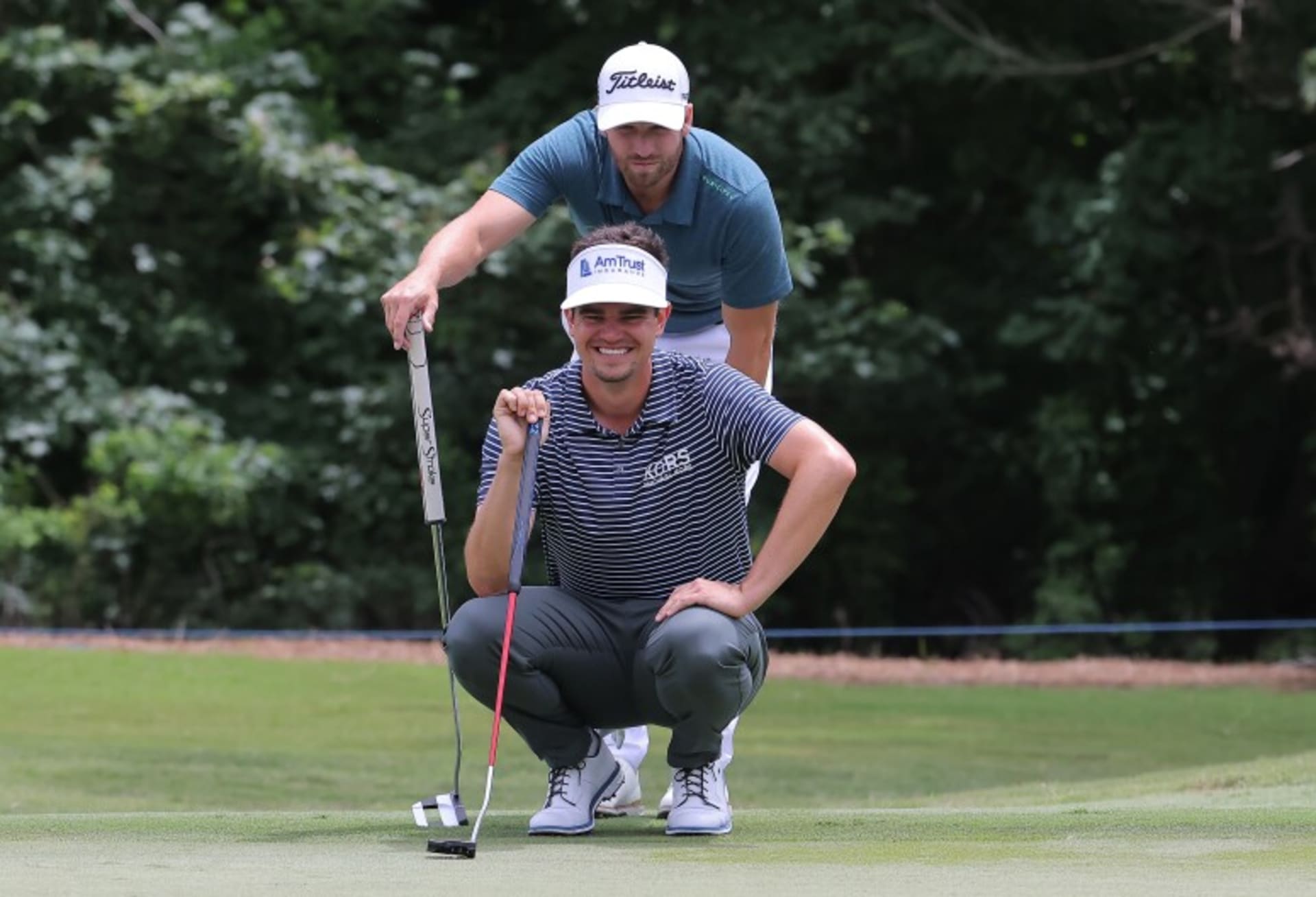 AVONDALE, LOUISIANA - APRIL 23: Beau Hossler of the United States and Wyndham Clark of the United States line up a putt on the fourth green during the final round of the Zurich Classic of New Orleans at TPC Louisiana on April 23, 2023 in Avondale, Louisiana. (Photo by Jonathan Bachman/Getty Images)Photo Credit: Getty Images