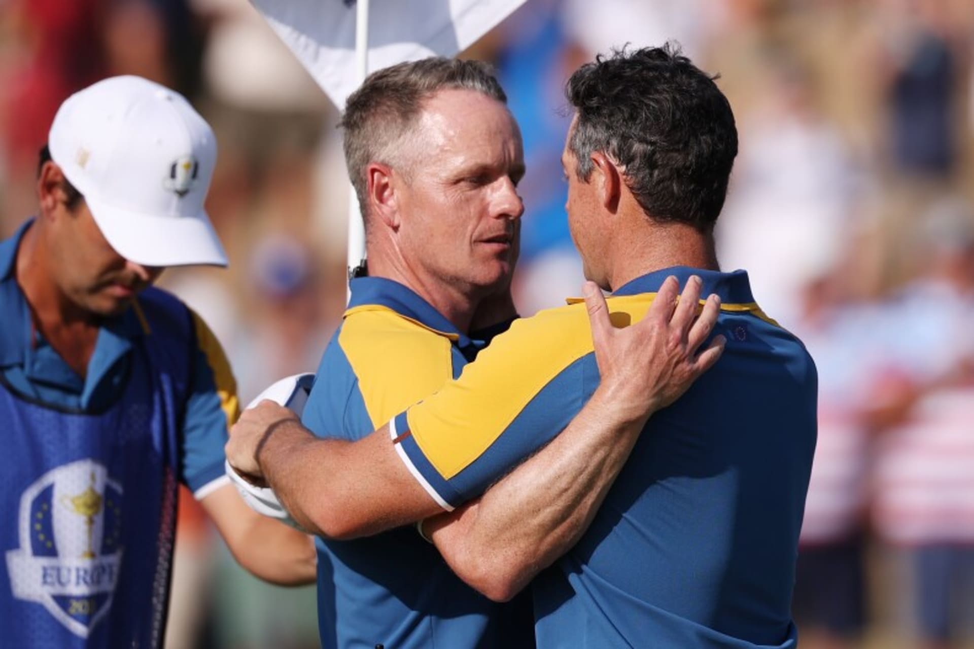 ROME, ITALY - OCTOBER 01: Rory McIlroy of Team Europe celebrates winning his match 3&1 with Luke Donald, Captain of Team Europe on the 17th green during the Sunday singles matches of the 2023 Ryder Cup at Marco Simone Golf Club on October 01, 2023 in Rome, Italy. (Photo by Richard Heathcote/Getty Images)Photo Credit: Getty Images
