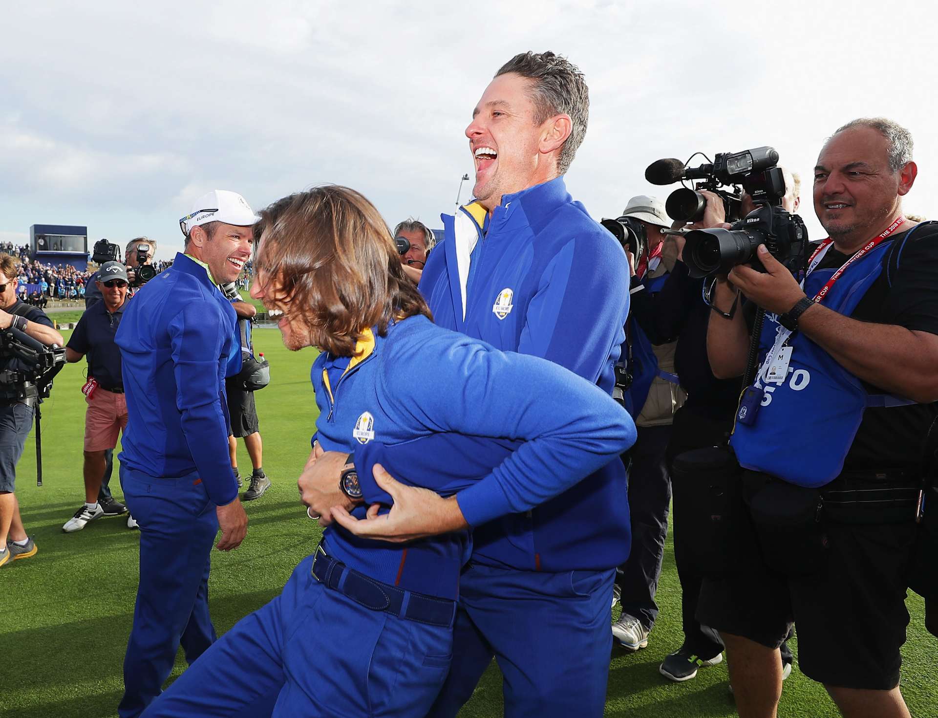 PARIS, FRANCE - SEPTEMBER 30: Tommy Fleetwood of Europe and Justin Rose of Europe celebrate winning The Ryder Cup during singles matches of the 2018 Ryder Cup at Le Golf National on September 30, 2018 in Paris, France. (Photo by Richard Heathcote/Getty Images)