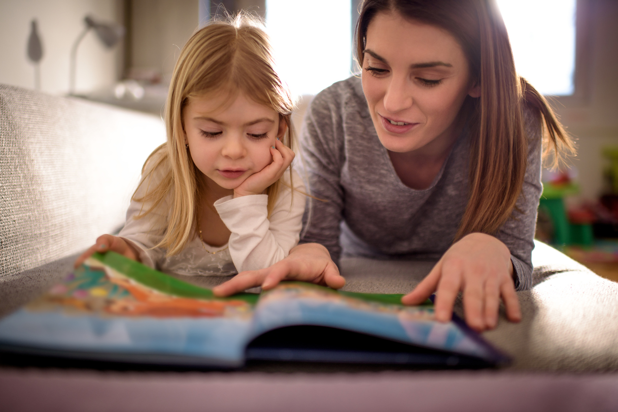 Another parent telling a story to her kid