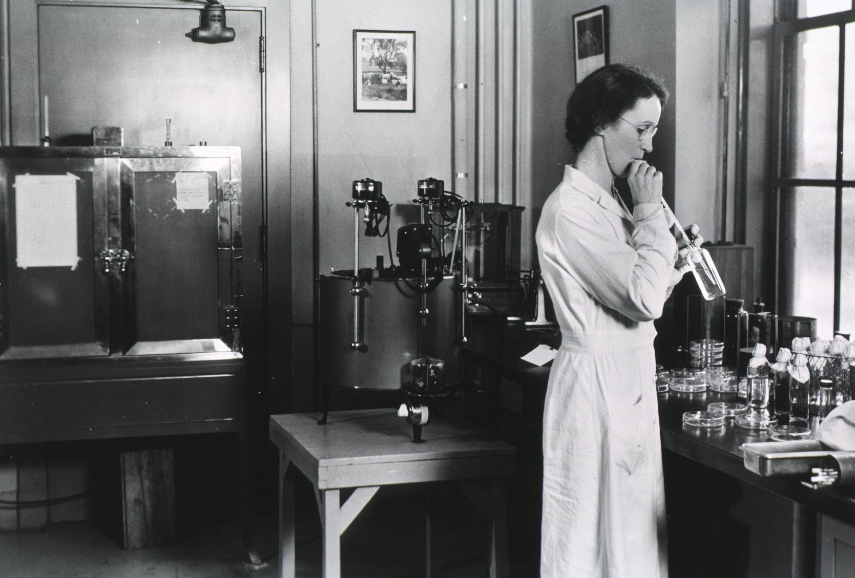 Dr. Adah Elizabeth Verder using a mouth pipette, ca. 1938.