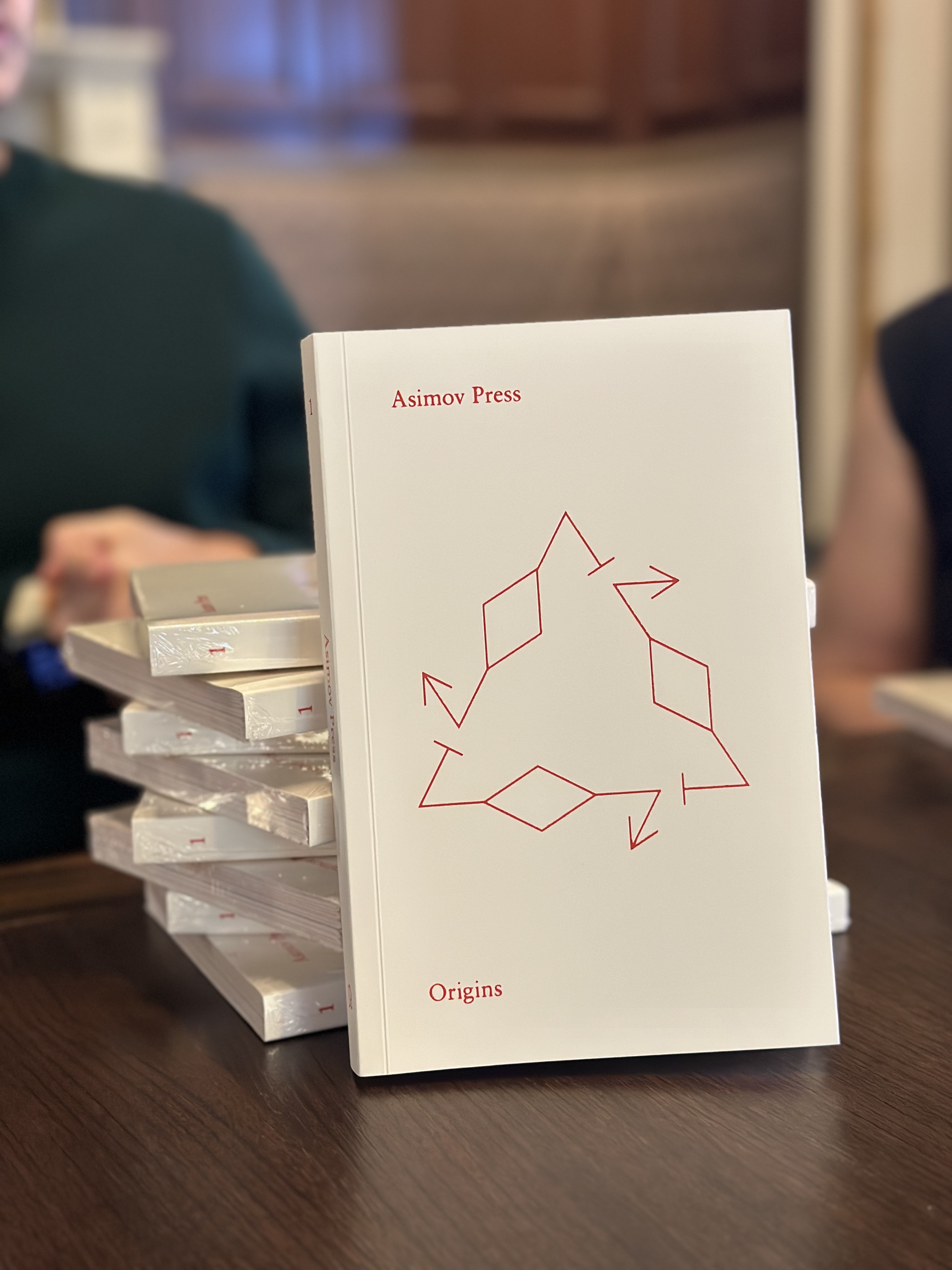 A photograph of Origins, the first book from Asimov Press.