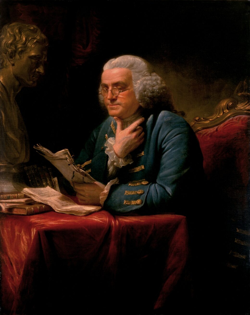 A painting of Benjamin Franklin, completed in 1766, with a marble bust of Isaac Newton facing him.
