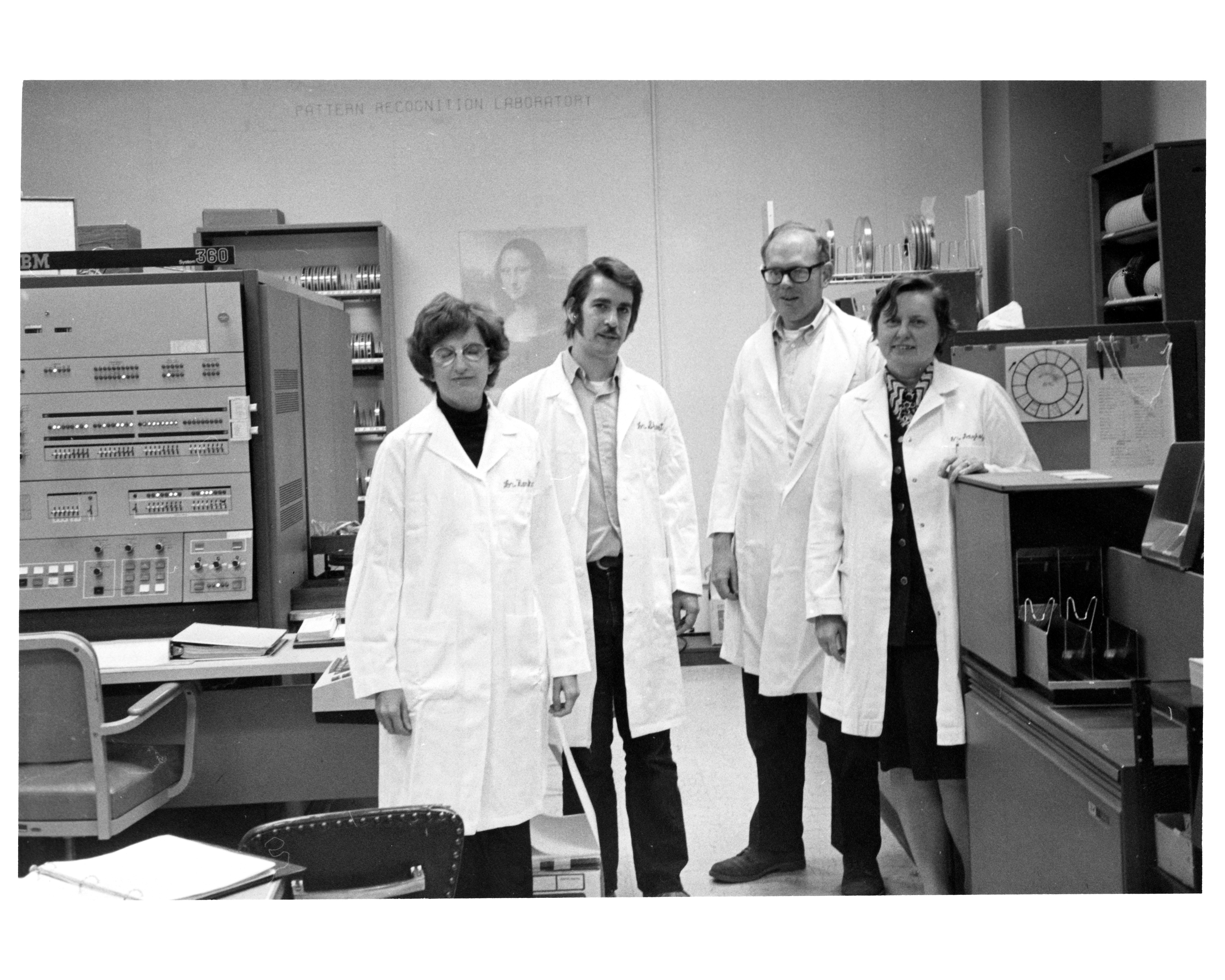 Margaret Dayhoff and colleagues in the computer room