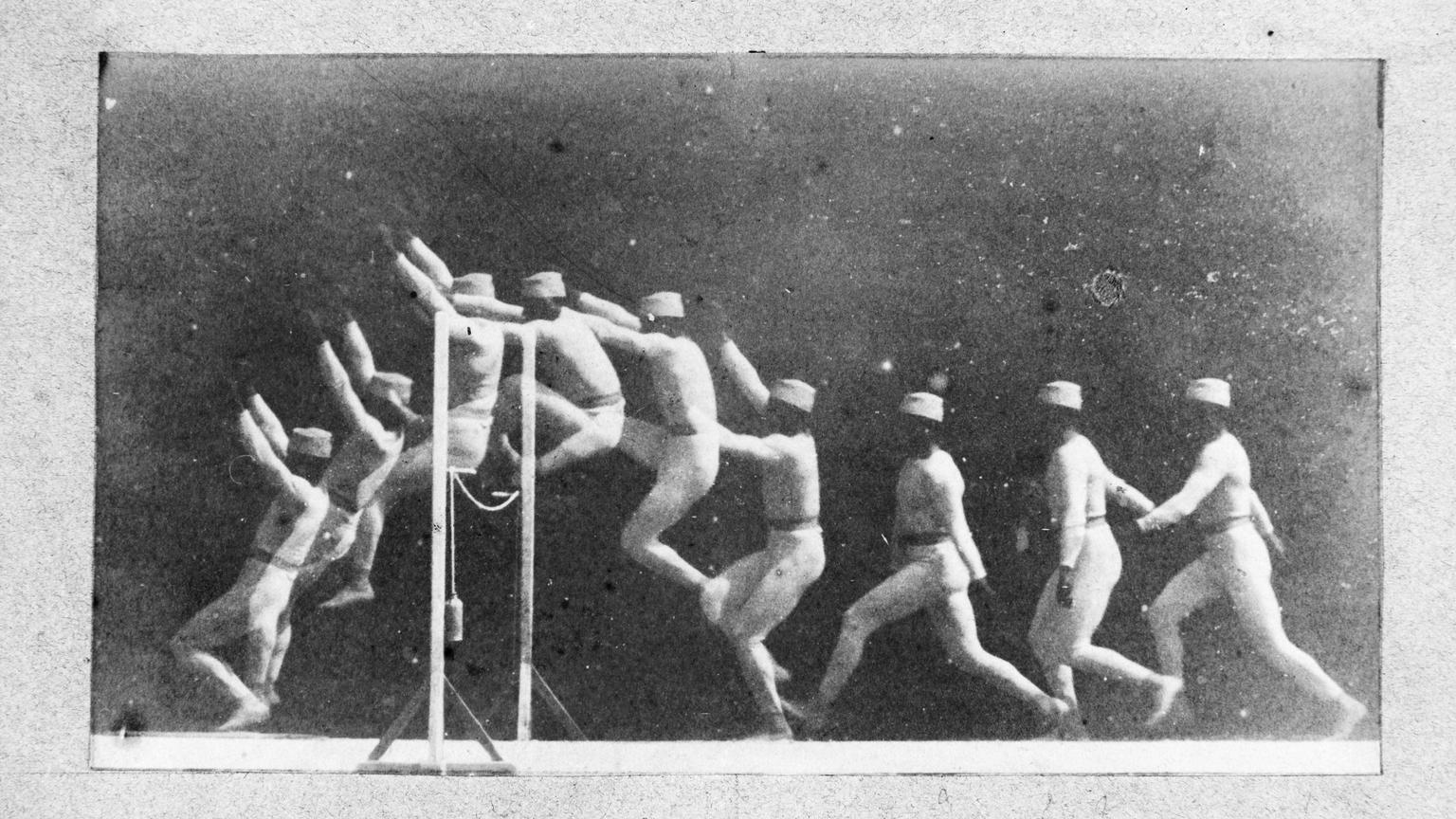 Phases of movement as a man jumps a hurdle