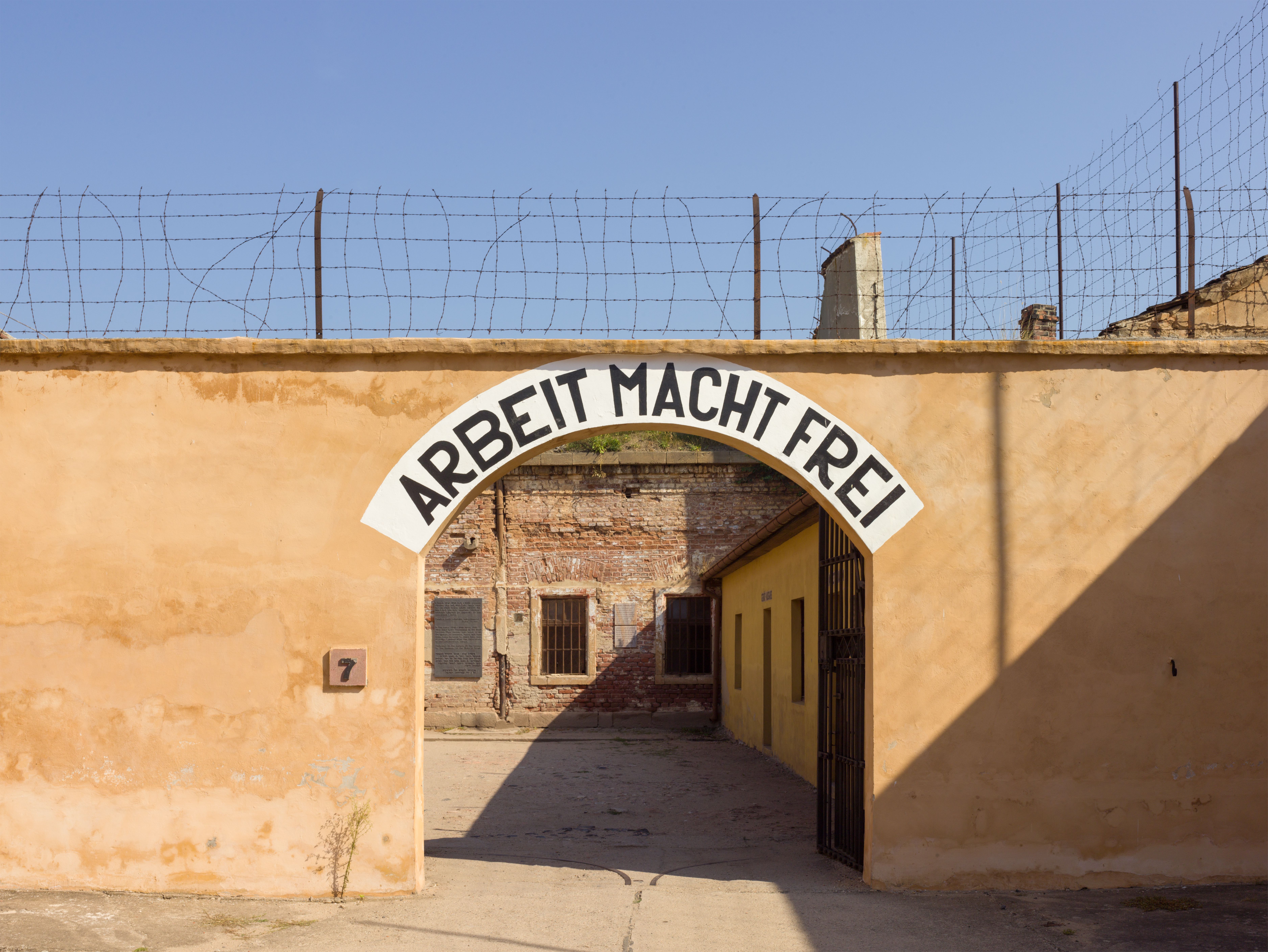 The Theresienstadt archway bearing the words 'Arbeit macht frei.'