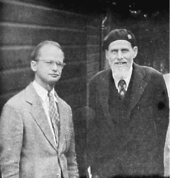 Warren McCulloch and Walter Pitts standing outside a building.