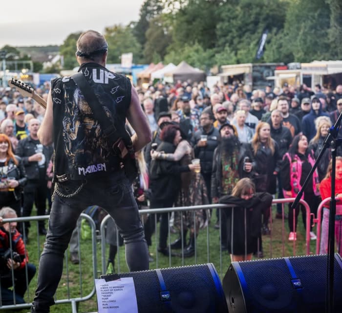 Ey Up Maiden live at Saltaire Festival 2026: the band, with the crowd