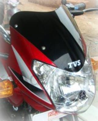 tvs sport bike headlight visor price