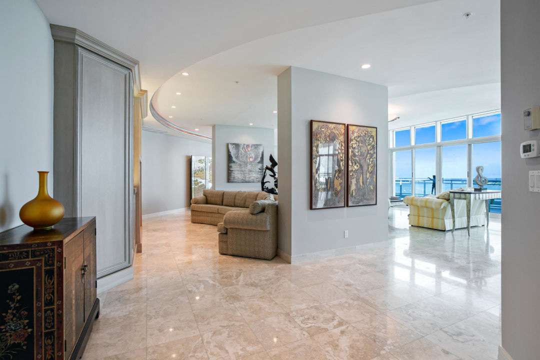 Foyer and living area in Sarasota penthouse