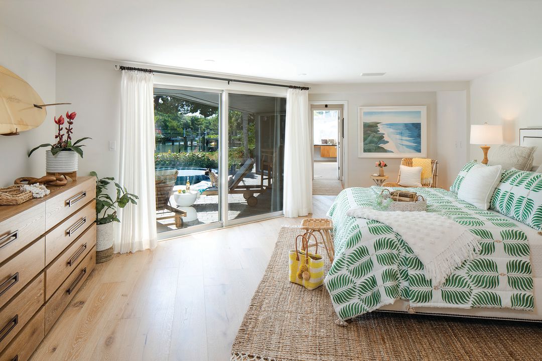 The master bedroom offers a floor-to-ceiling view of the outdoors.