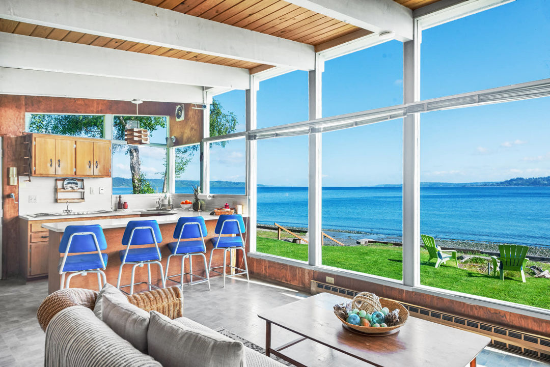 Property Watch: A Tiny Waterfront Cabin with a Bananas View 2 living room 4 pg6rit