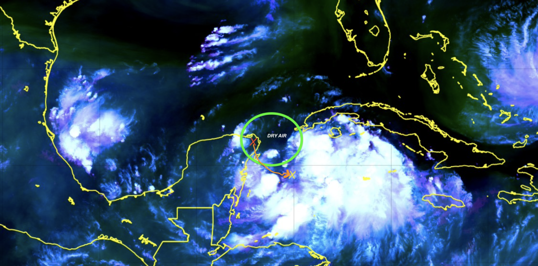 Dry air is slowing down the storm's formation.