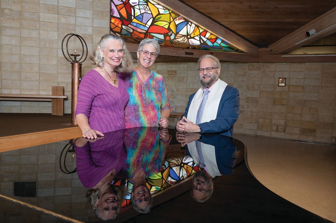 Unitarian Universalist Church of Sarasota minister Rev. Jay Wolin with church director of finance and operations Roberta Druif (left) and her partner Doreen Dunn.