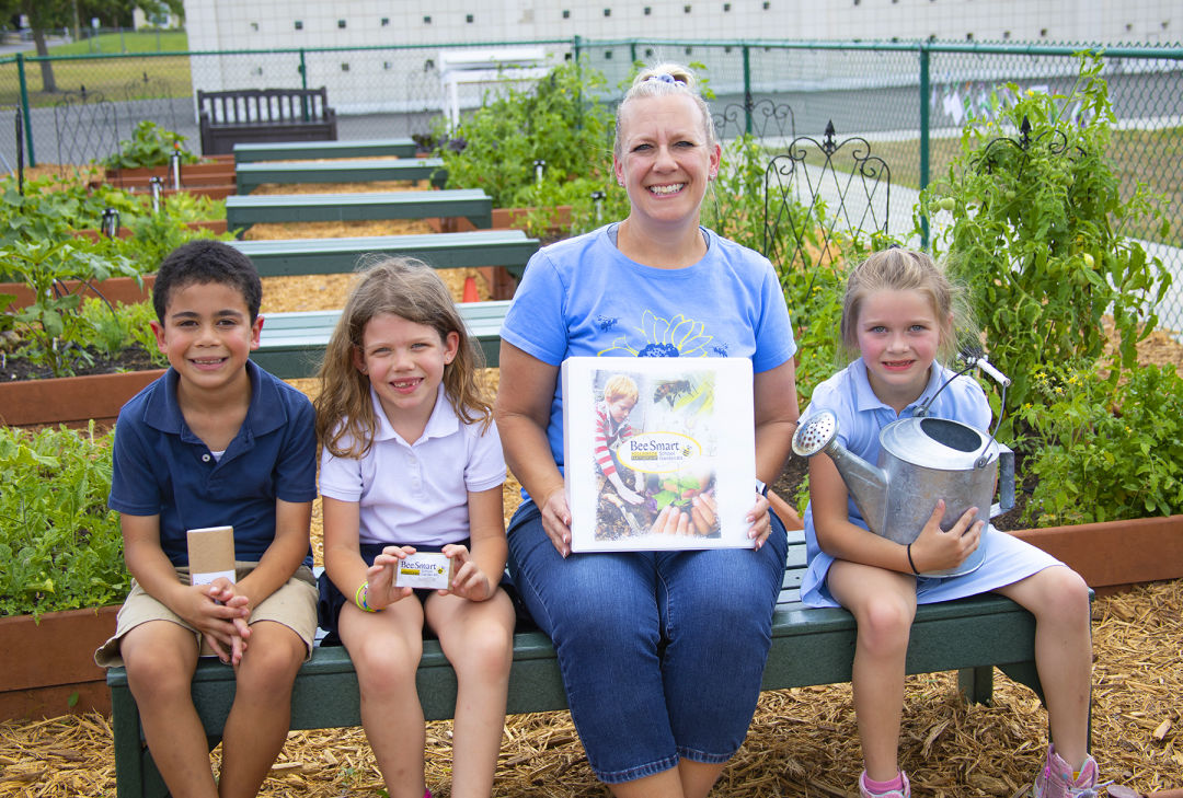 Picture of Cranberry Elementary students and teacher with their Bee Smart Gardening Kit