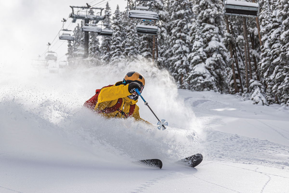 Photo & Art Print Freeride skiier riding in deep powder snow