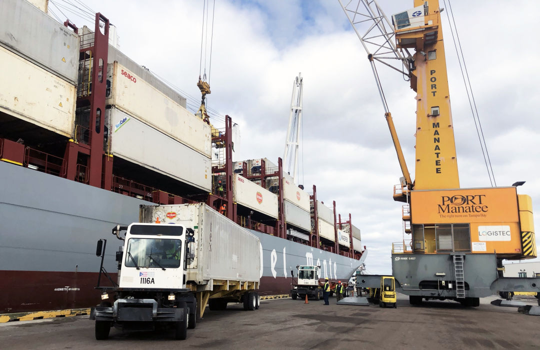 Containers are offloaded from Fresh Del Monte Produce Inc.’s Del Monte Spirit as the energy-efficient vessel makes its Jan. 9 inaugural call at Port Manatee.