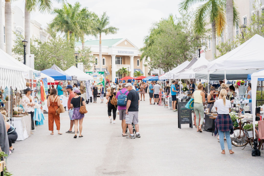 People browsing local vendors at Main Street Market in Lakewood Ranch