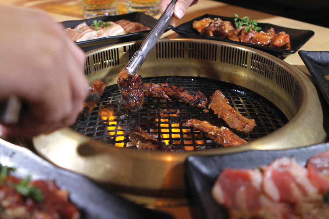 restaurant where you cook your own food in broth