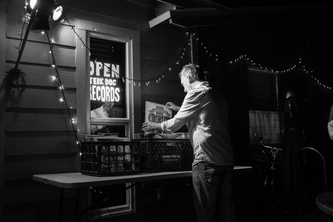 Doug Holland flips through the bins at Jerk Dog Records