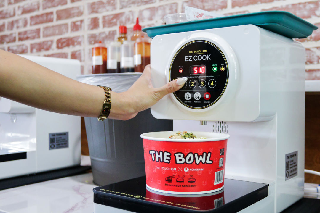 Picture of an induction ramen machine boiling ramen.