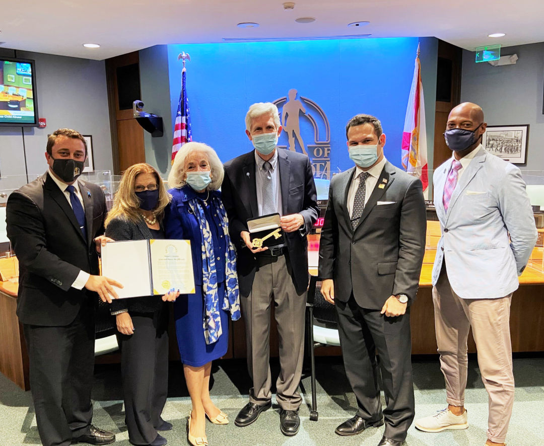 From left: Mayor Hagan Brody, Commissioner Liz Alpert, Graci McGillicuddy, Dennis McGillicuddy, Commissioner Erik J. Arroyo, Commissioner Kyle S. Battie.