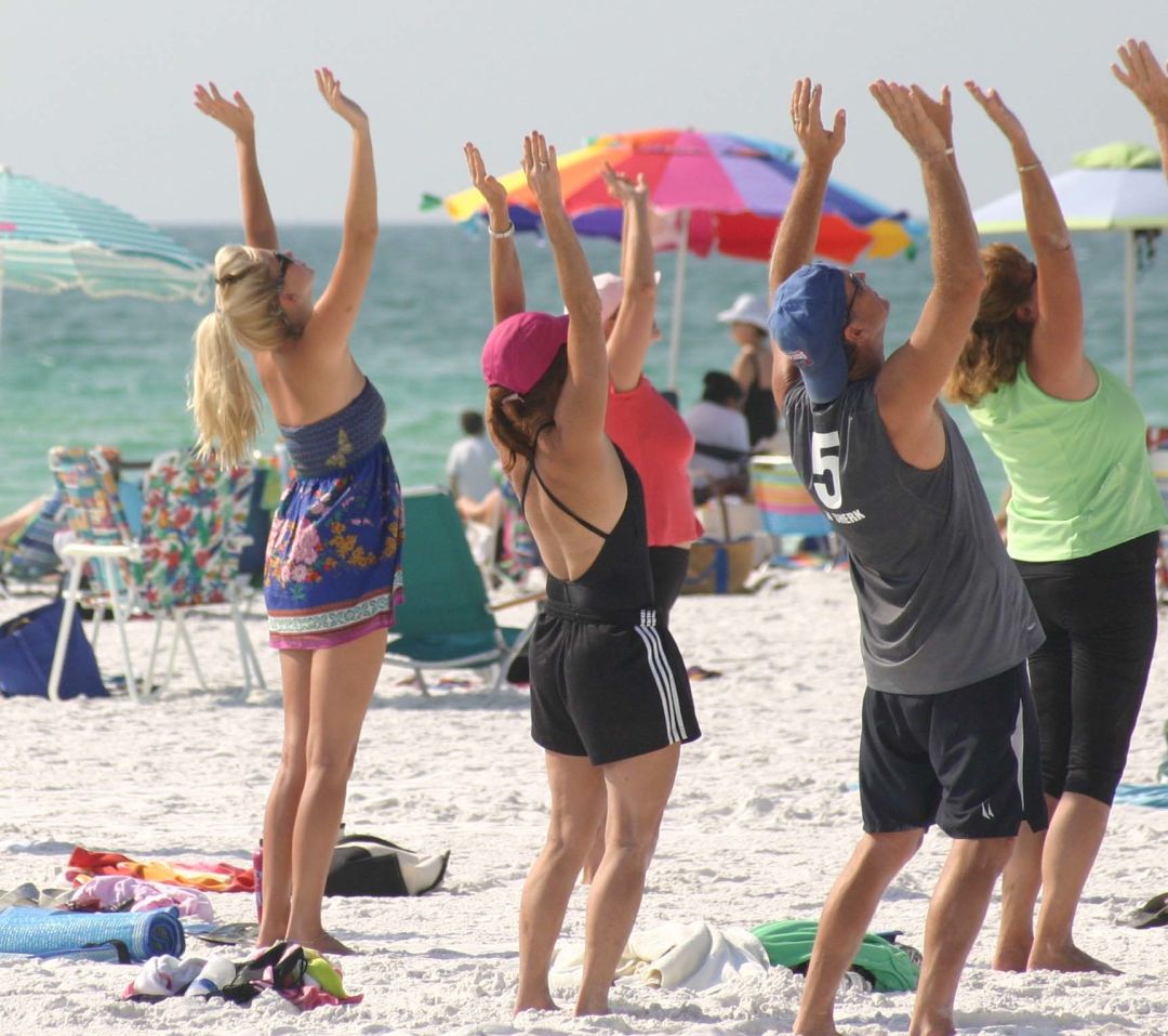 Standing yoga on the beach r8ehkv