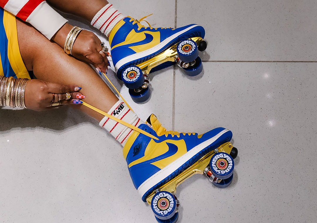A pair of custom roller skates made from blue and yellow sneakers being modeled.
