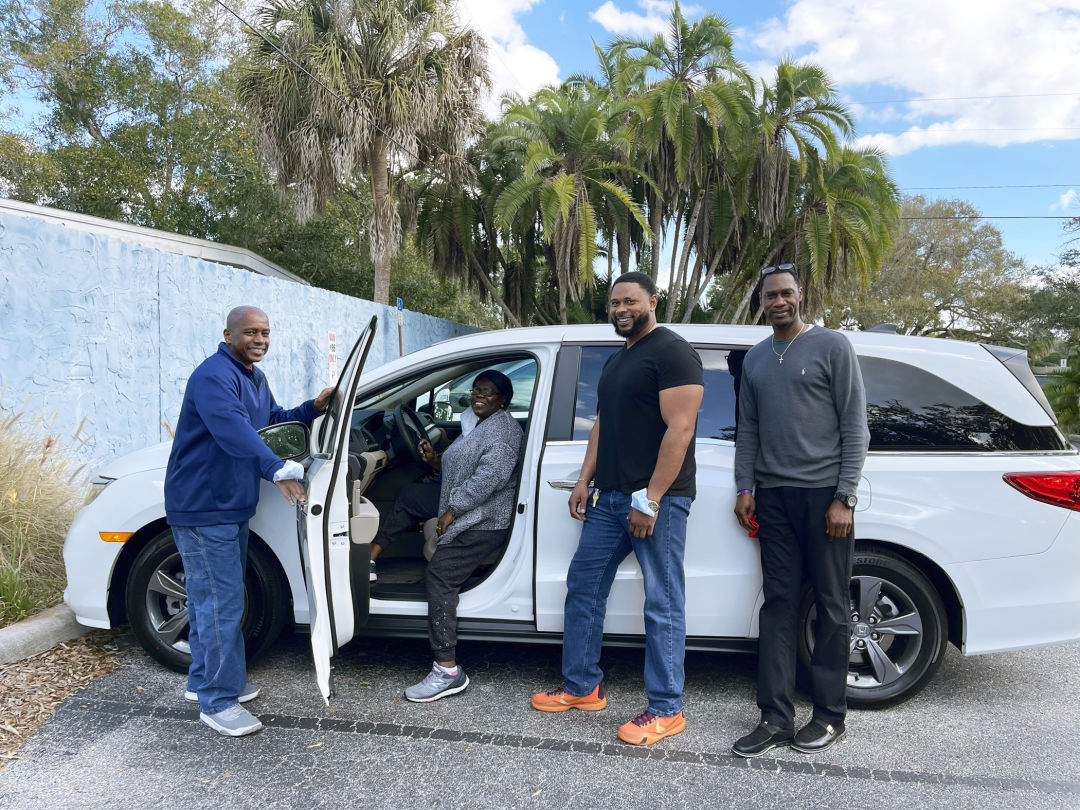 Safe Children Coalition Youth Shelter staff members (from l-r) Alan Abernathy, Janice Sparkes, Charles Harris and Aaron Bellamy with the new van, purchased through a grant from the Roberta Leventhal Sudakoff Foundation