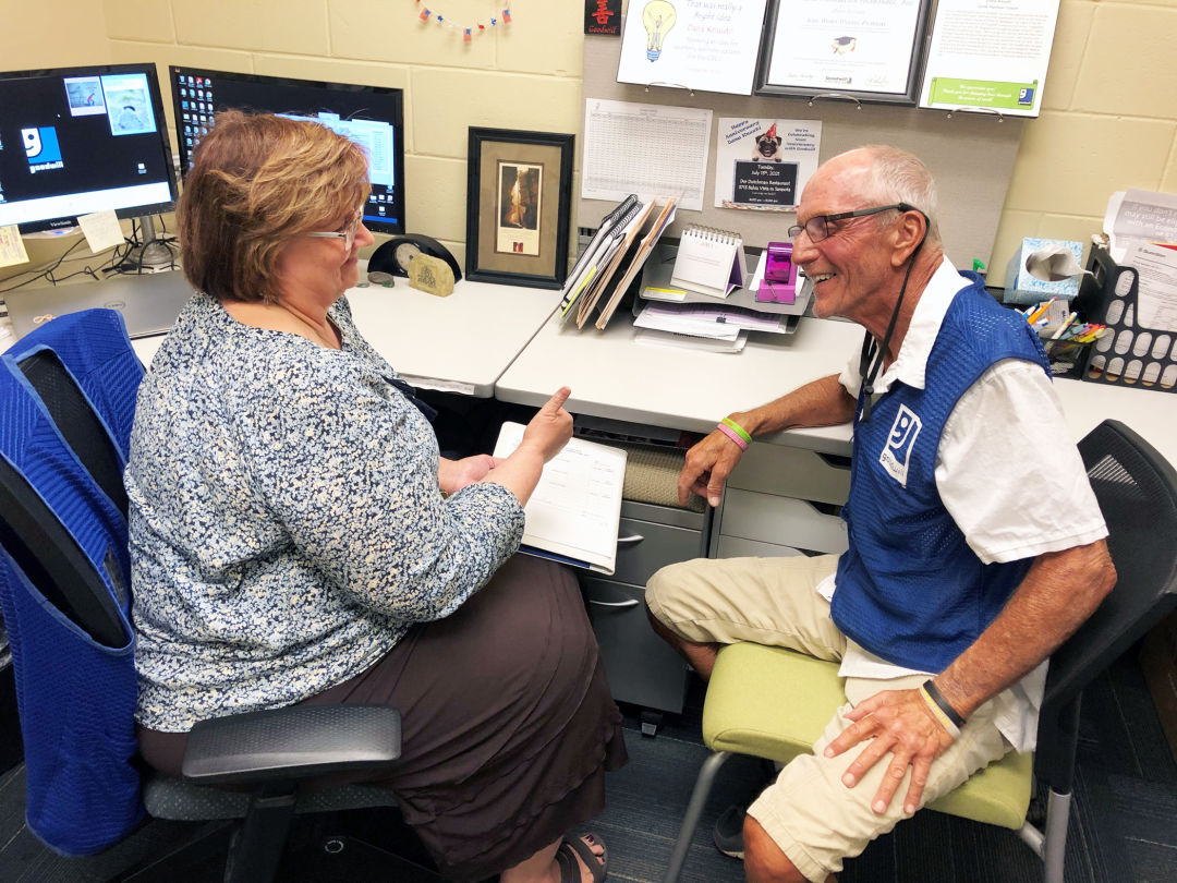 Goodwill Manasota GoodPartner coach Dana Knuuti with team member Dennis Burton.