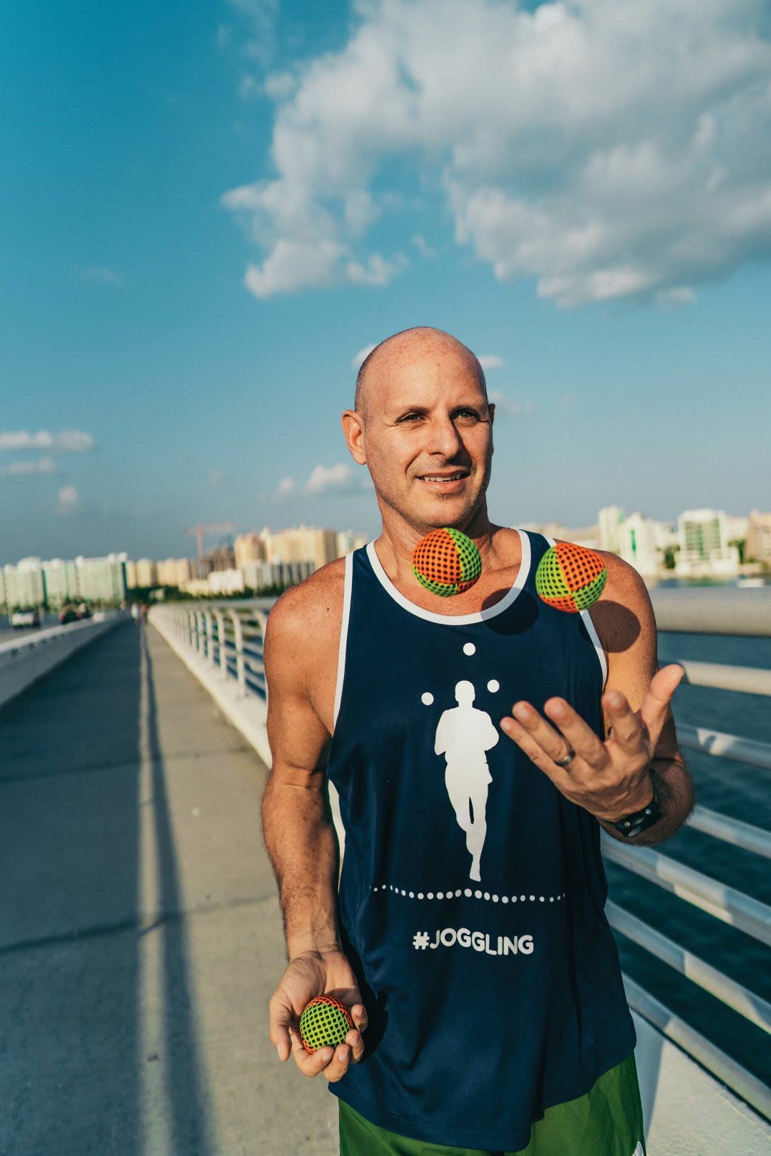 Barak Hirschowitz juggles while jogging—also known as joggling.