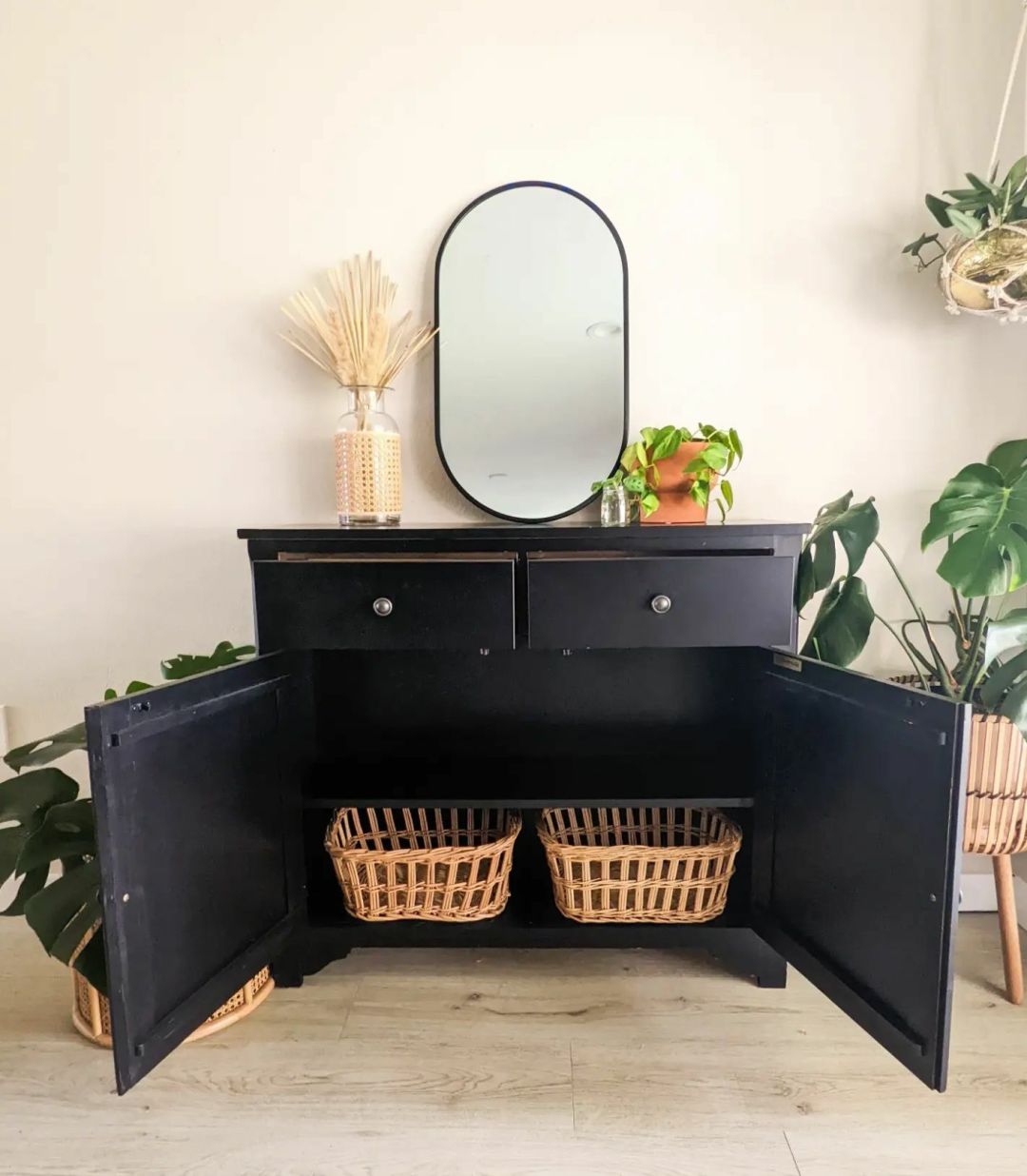 A black armoire from The Woven Home.