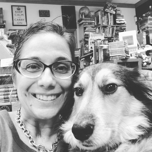 Owner Barbara Barone with Max, the shop dog