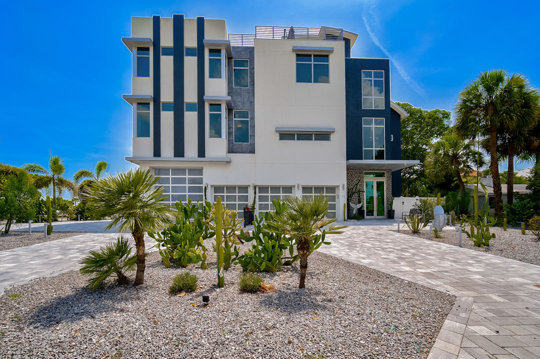 Exterior of a three storied, luxury home on Lido Key.